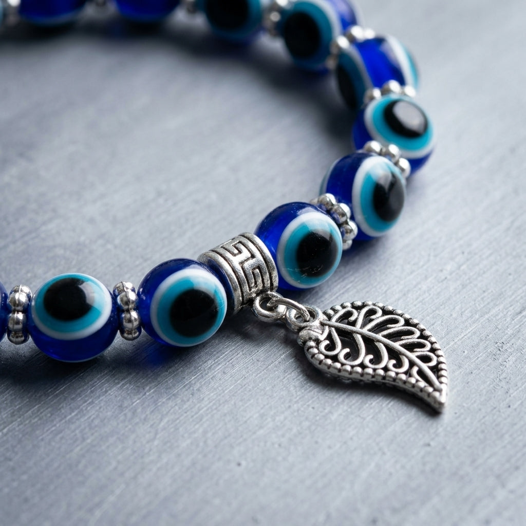 Handmade Blue Evil Eye & Leaf Charm Beaded Bracelet | Nature-Inspired Protection Jewelry