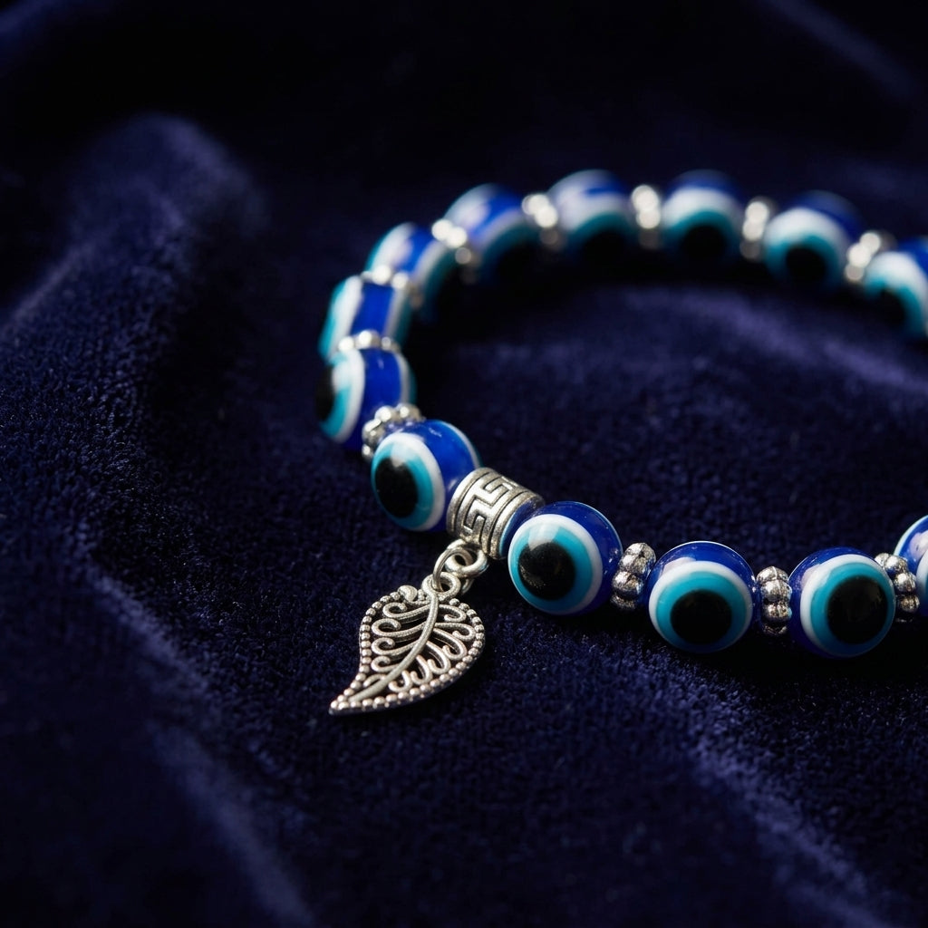 Handmade Blue Evil Eye & Leaf Charm Beaded Bracelet | Nature-Inspired Protection Jewelry